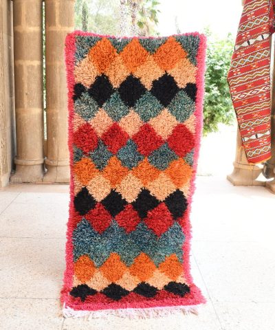 a colorful rug on the floor. il_fullxfull.6076302223_csf0.jpg