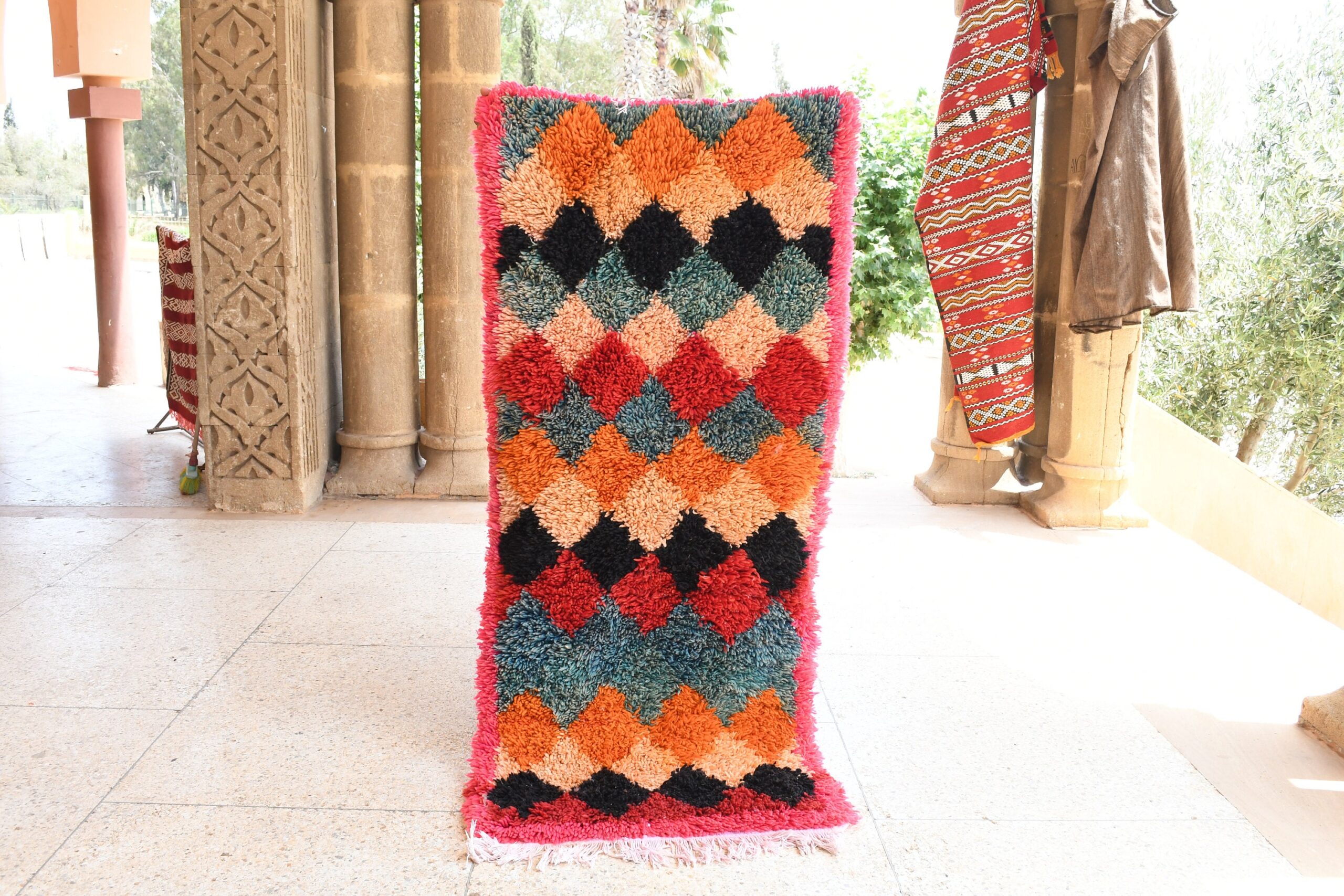 a colorful rug on the floor. il_fullxfull.6076302223_csf0.jpg