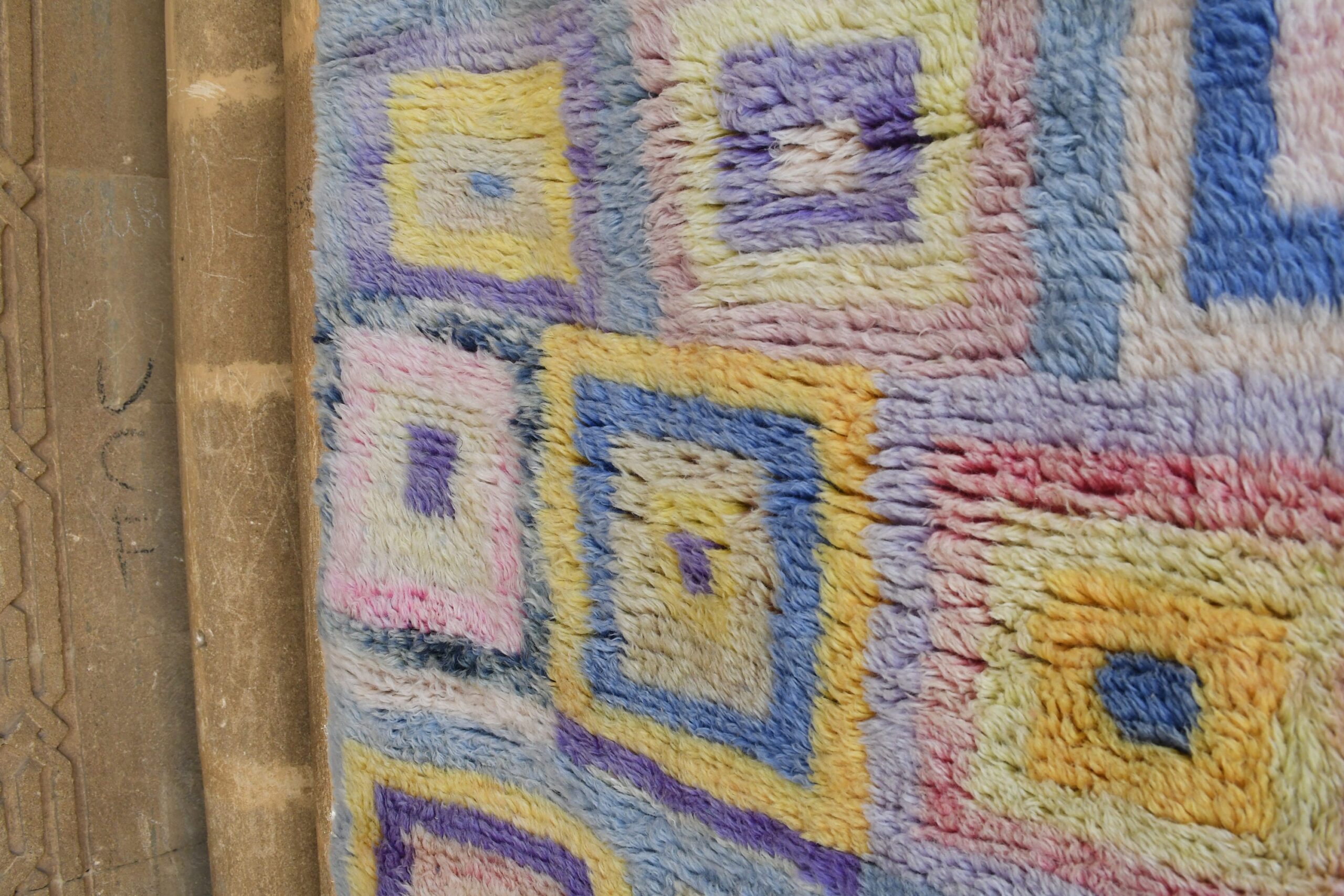 a colorful rug on a wooden floor. il_fullxfull.6083089353_1vl5.jpg