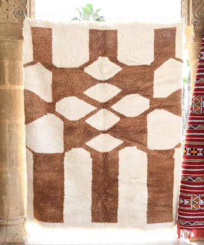 a rug hanging on a wall in a room. il_fullxfull.6083100891_31l3.jpg