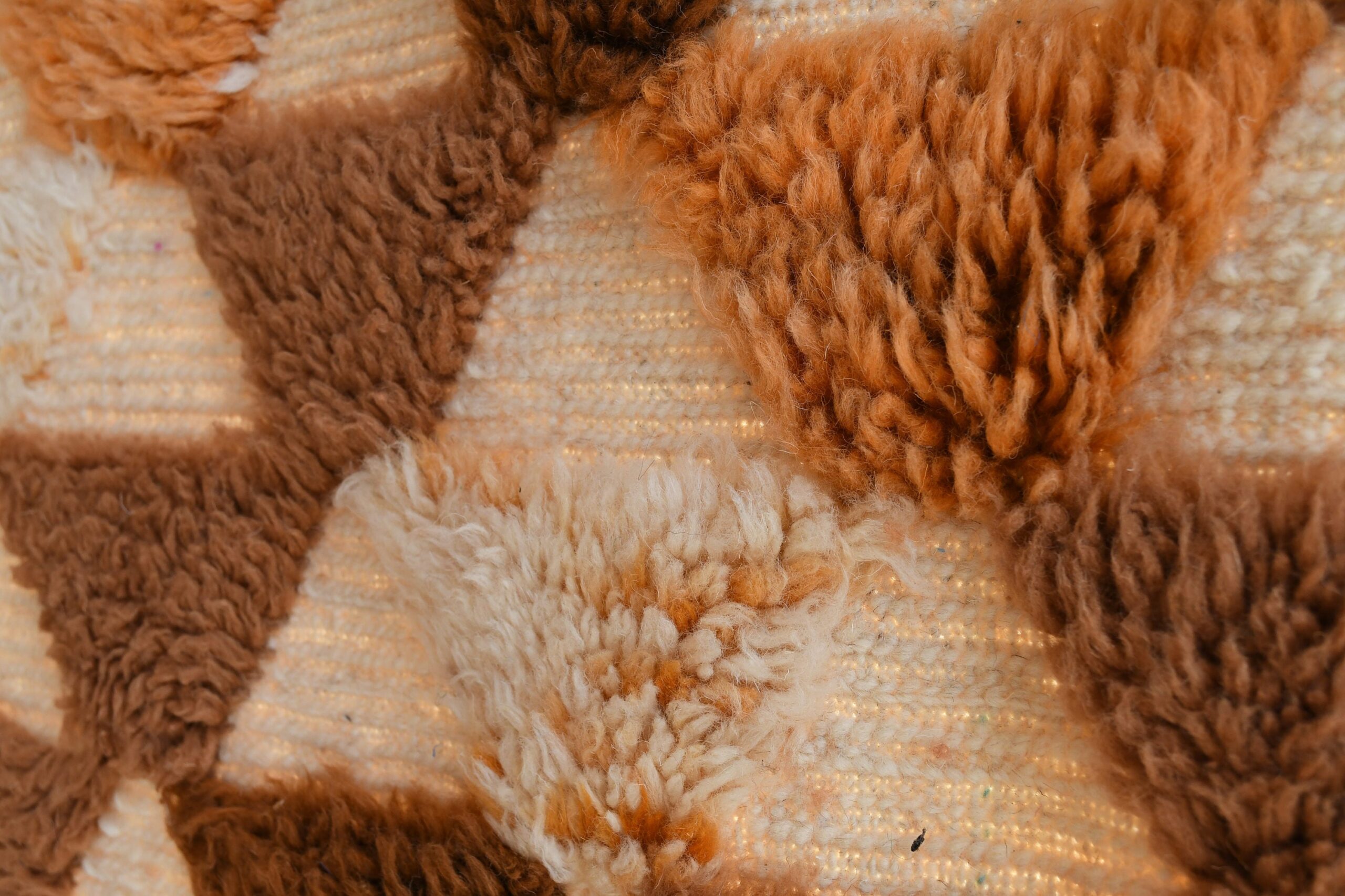 a teddy bear is laying on a moroccan rug. il_fullxfull.6083103843_jtc7.jpg