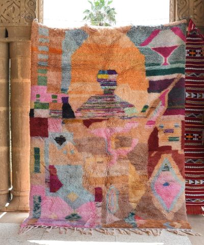 a colorful rug is hanging on a wall. il_fullxfull.6083105995_8ms1.jpg