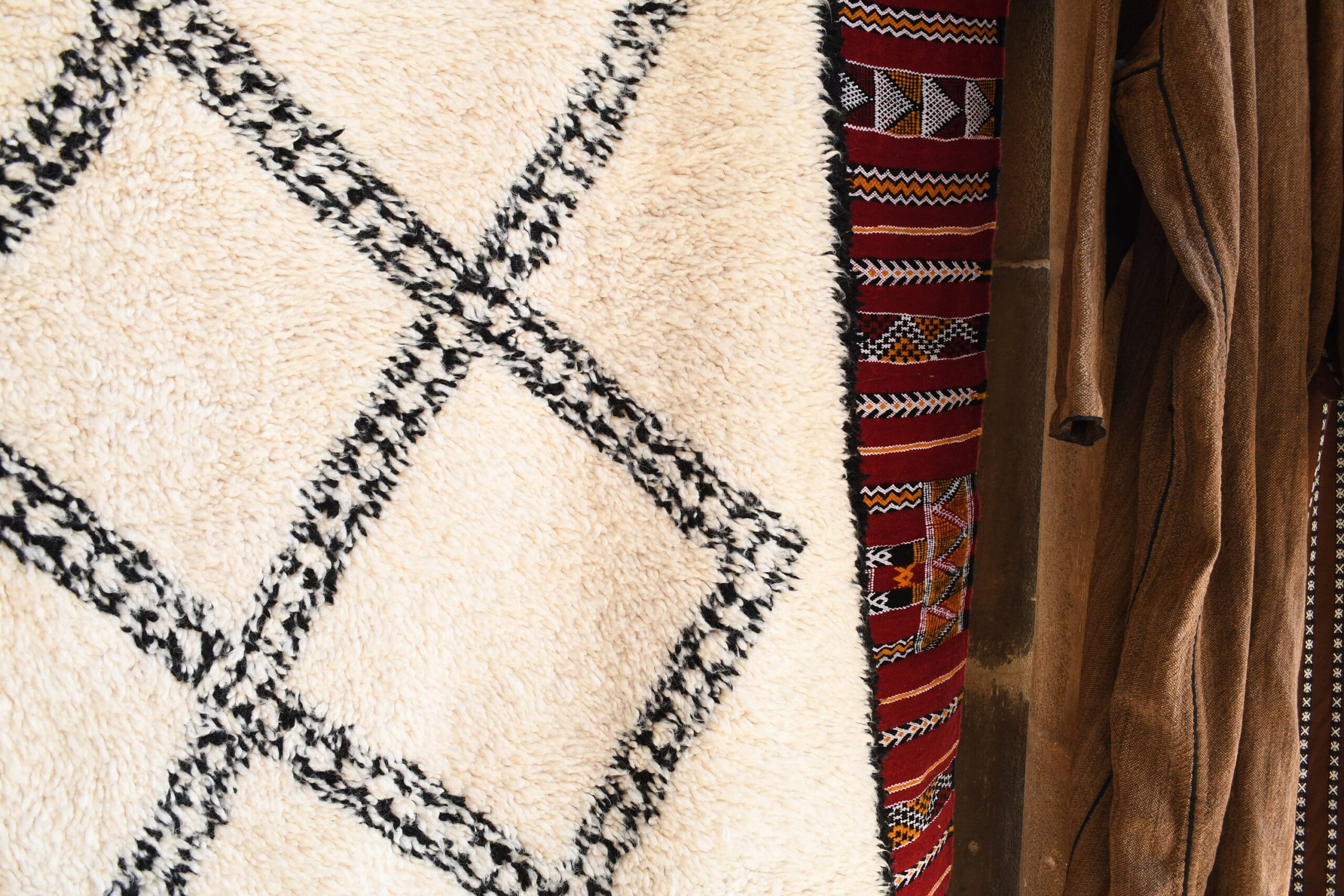 a brown jacket hanging on a wall. il_fullxfull.6083119867_jqs2.jpg