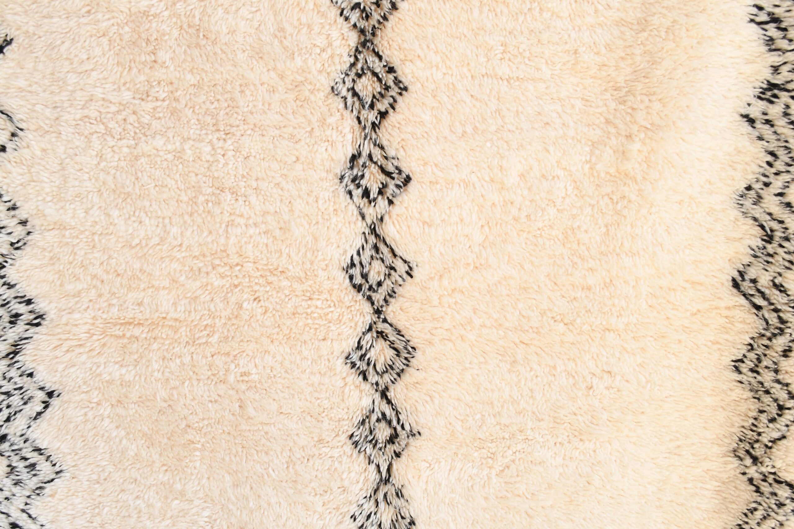 a close up of a rug with a black and white pattern. il_fullxfull.6083133073_inqw-1.jpg