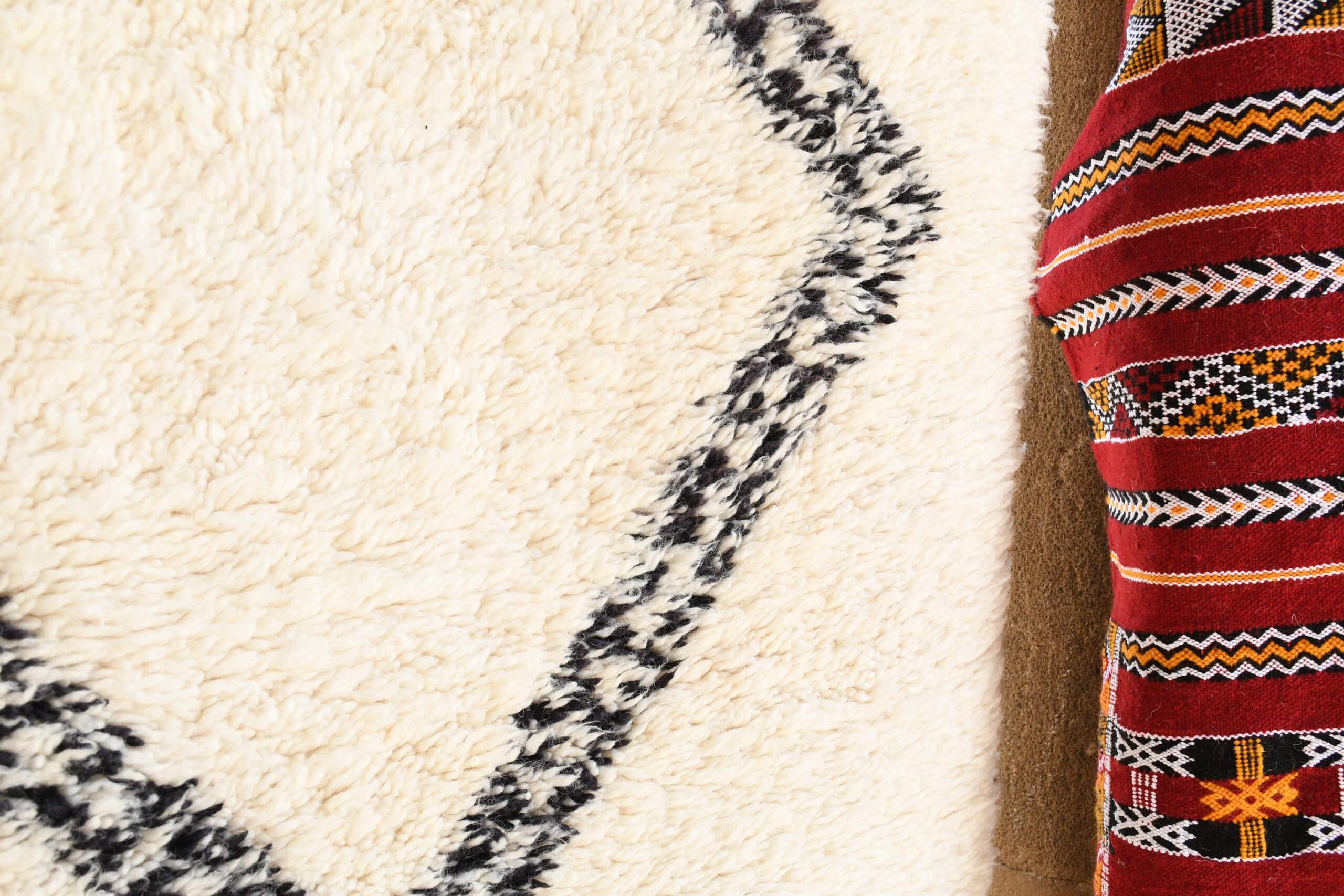 a moroccan rug is laying on a rug. il_fullxfull.6083135903_1c5i.jpg