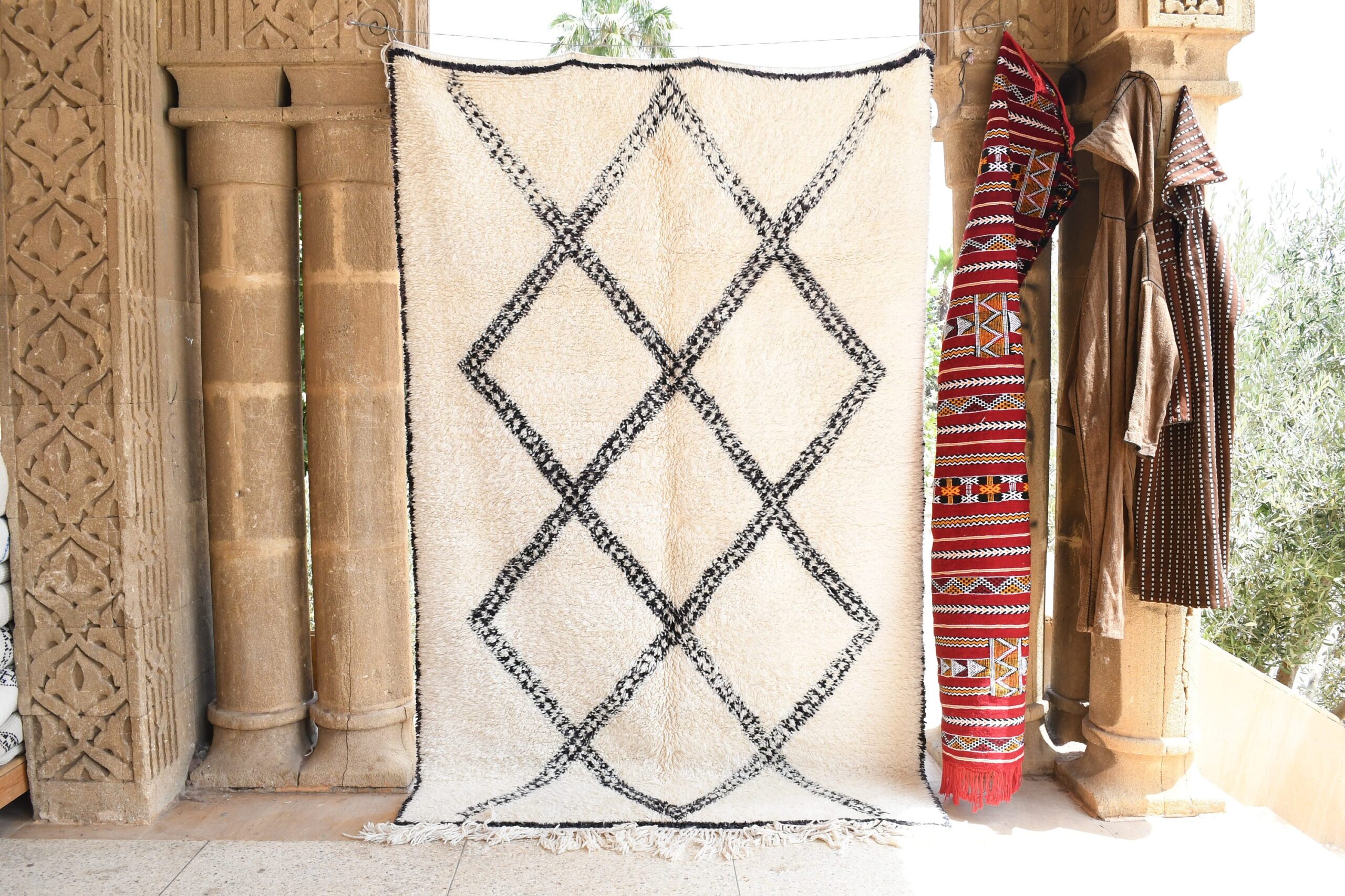 a rug hanging on a wall in a room. il_fullxfull.6083136767_2zsn.jpg