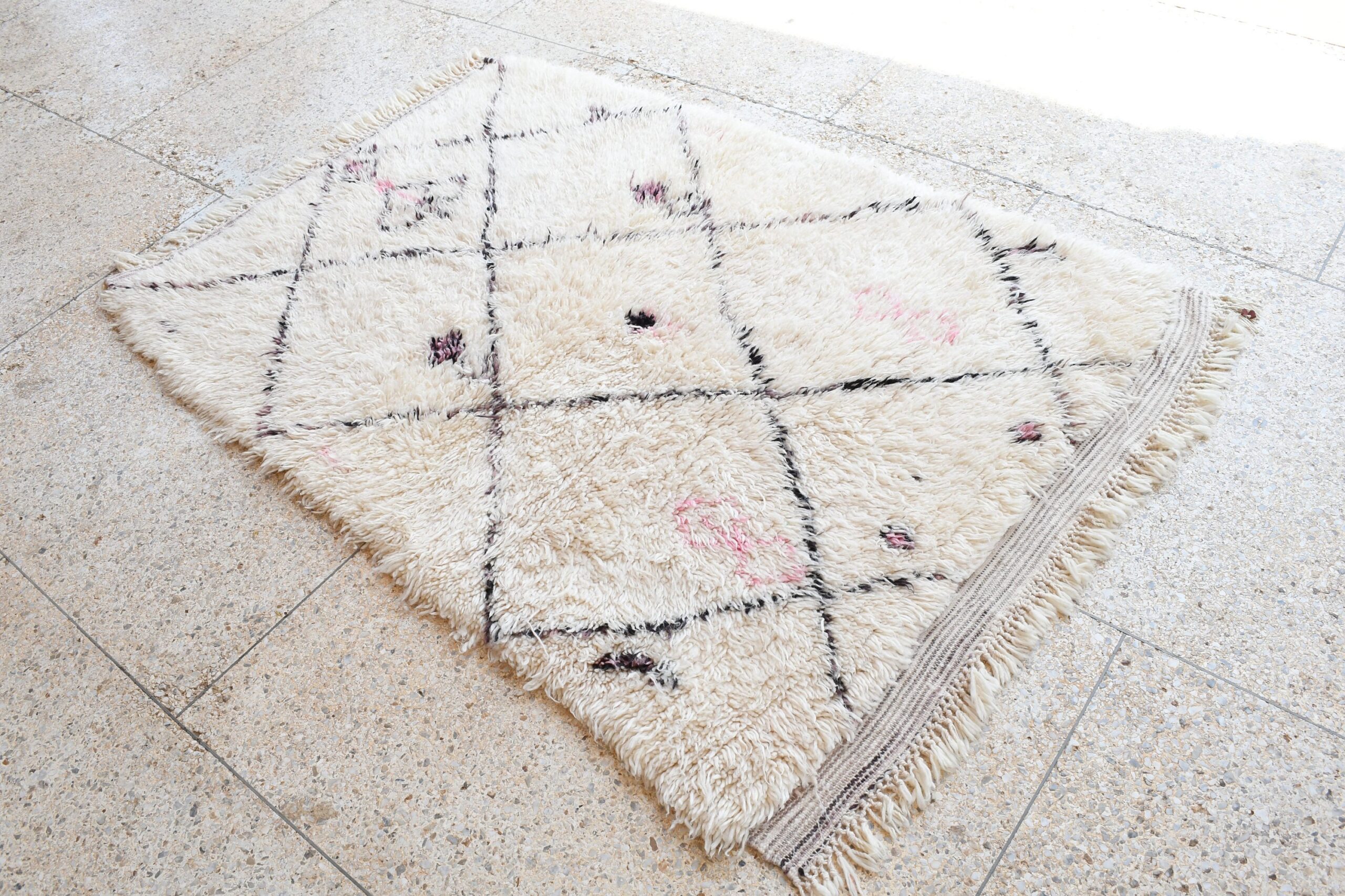 a rug on the floor. il_fullxfull.6083149359_8ckl.jpg