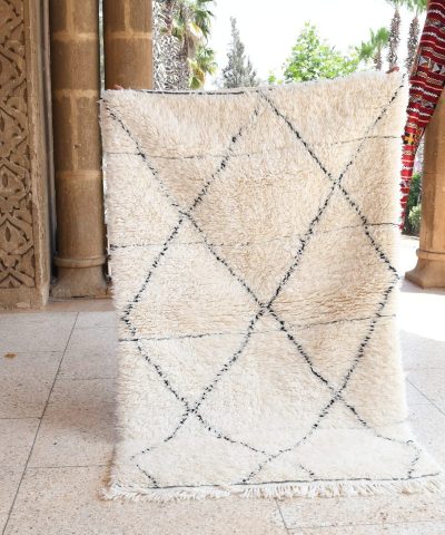 a rug is on the floor in a room. il_fullxfull.6083154447_1rc4.jpg